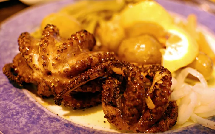 Grilled octopus polvo à lagareiro with potatoes and olive oil